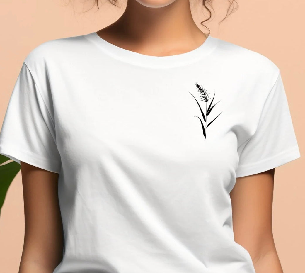 Moteriški marškinėliai “Smilga” su minimalistiniu gamtos motyvu, simbolizuojančiu ramybę ir natūralumą.